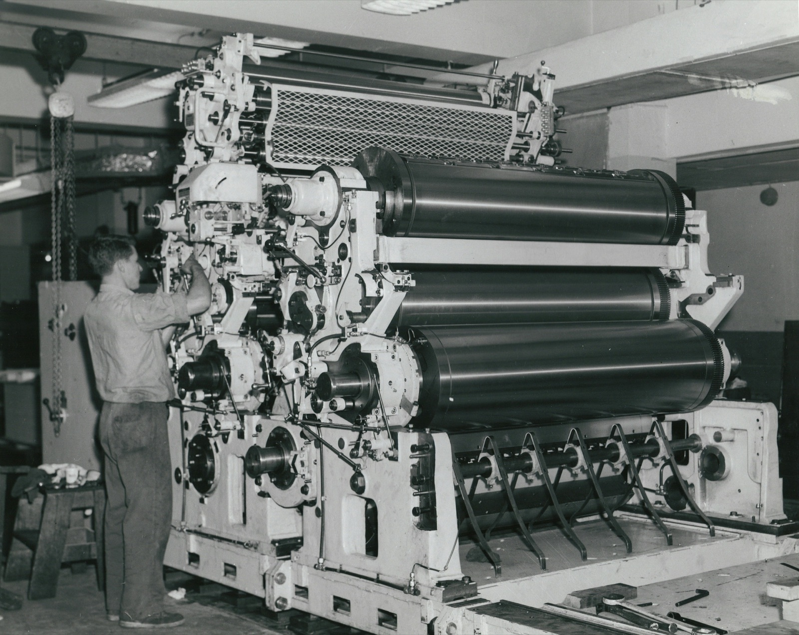 A commercial book printer running a print job